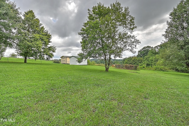 4970 Old Stage Rd, Chuckey, TN 37641 - view of grassy yard with an outbuilding