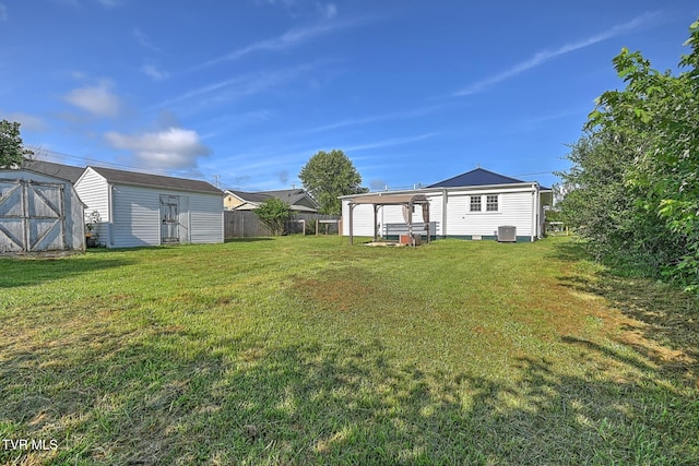810 N Roan St, Elizabethton, TN 37643 - view of yard featuring a storage shed