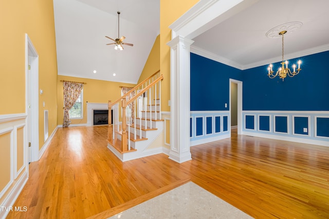 2003 Hackberry Dr, Jonesborough, TN 37659 - foyer entrance with wood finished floors, ceiling fan, a fireplace, high vaulted ceiling, and stairway