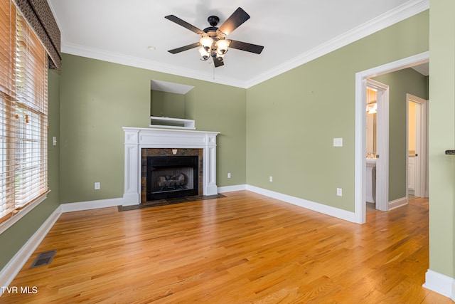 2003 Hackberry Dr, Jonesborough, TN 37659 - unfurnished living room featuring light wood finished floors, ceiling fan, a fireplace, and ornamental molding