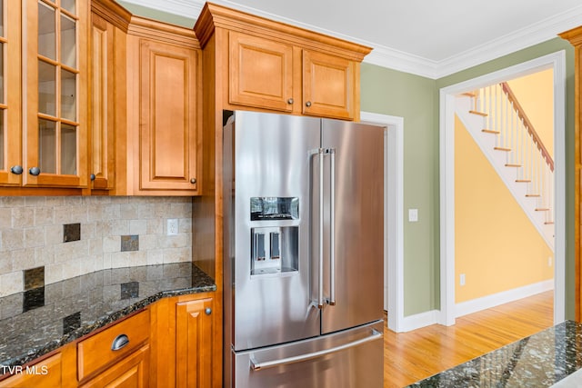 2003 Hackberry Dr, Jonesborough, TN 37659 - kitchen with high end refrigerator, brown cabinetry, dark stone counters, and ornamental molding
