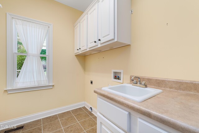 2003 Hackberry Dr, Jonesborough, TN 37659 - laundry room featuring hookup for a washing machine, cabinet space, tile patterned flooring, and hookup for an electric dryer