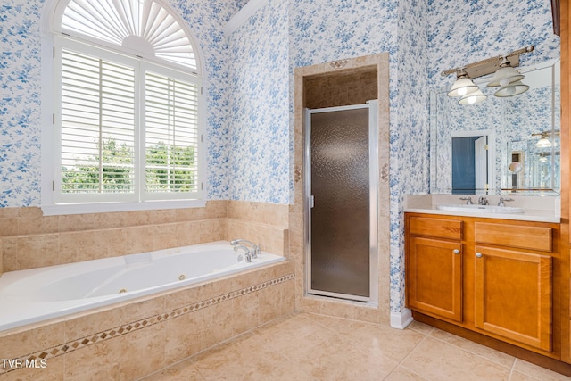 2003 Hackberry Dr, Jonesborough, TN 37659 - full bathroom featuring wallpapered walls, a stall shower, vanity, a tub with jets, and tile patterned flooring
