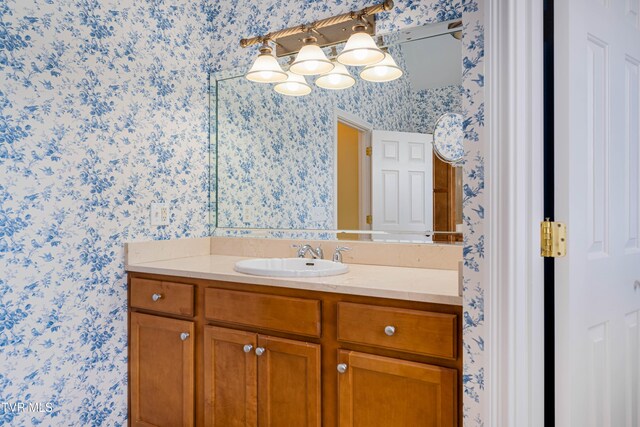 2003 Hackberry Dr, Jonesborough, TN 37659 - bathroom featuring wallpapered walls and vanity