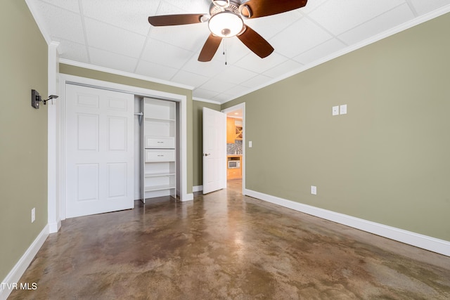 2003 Hackberry Dr, Jonesborough, TN 37659 - unfurnished bedroom with concrete flooring, a closet, ornamental molding, a paneled ceiling, and a ceiling fan