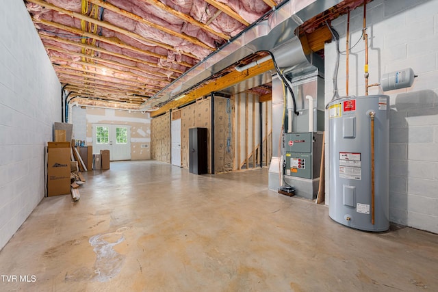 2003 Hackberry Dr, Jonesborough, TN 37659 - below grade area featuring water heater, concrete block wall, and heating unit
