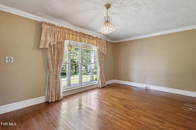 15493 Siesta Ave, Bristol, VA 24202 - spare room with hardwood / wood-style floors, a chandelier, a textured ceiling, and crown molding