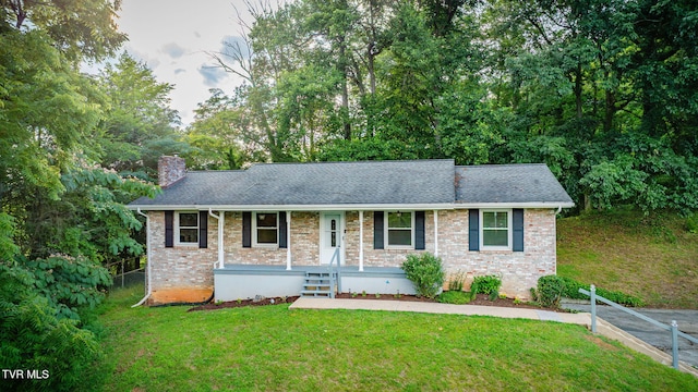 3513 Crest Rd, Kingsport, TN 37664 - ranch-style house with a chimney, covered porch, brick siding, and roof with shingles