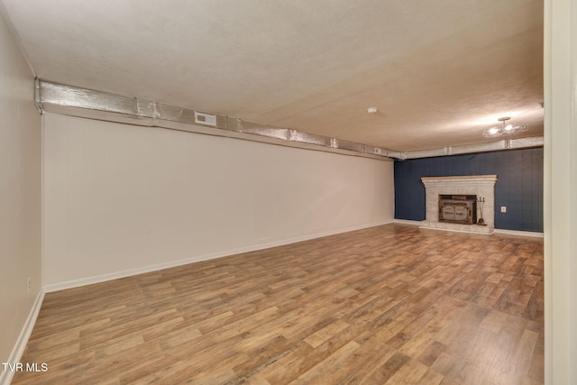 3513 Crest Rd, Kingsport, TN 37664 - finished below grade area with wood finished floors and a brick fireplace