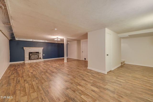 3513 Crest Rd, Kingsport, TN 37664 - finished below grade area with wood finished floors and a brick fireplace