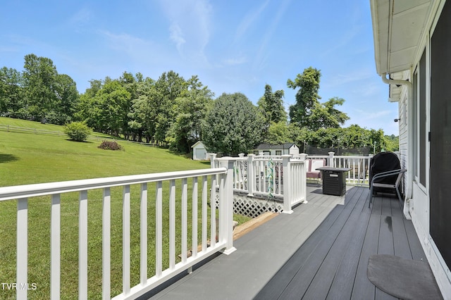 563 Old Jonesboro Rd, Bristol, TN 37620 - wooden deck with a shed, a yard, and view of scattered trees