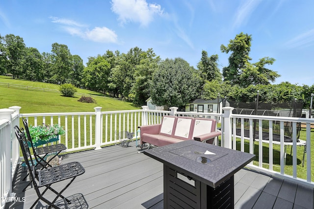 563 Old Jonesboro Rd, Bristol, TN 37620 - wooden deck with view of wooded area and a storage unit