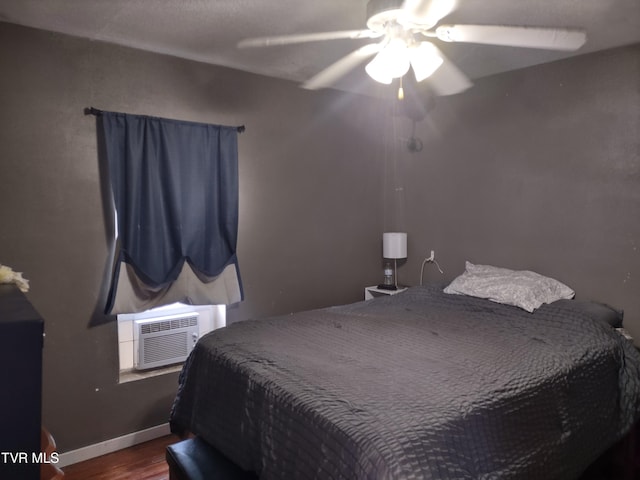 9060 Stillmeadows Ln, Meadowview, VA 24361 - bedroom featuring wood finished floors, a ceiling fan, and cooling unit