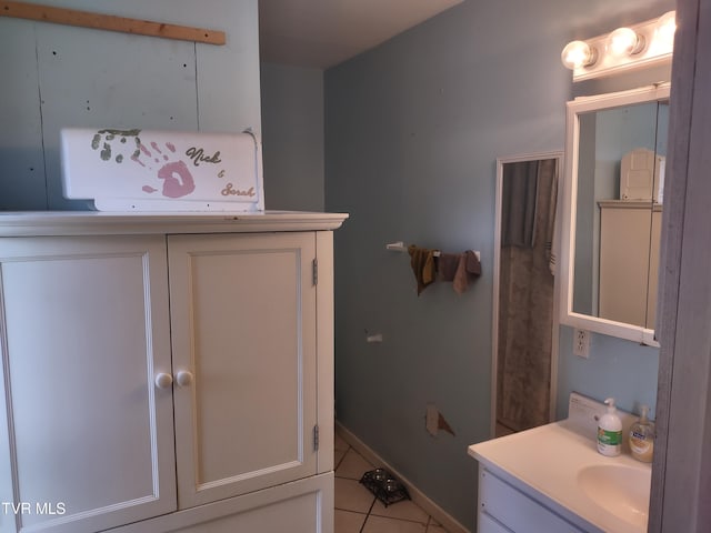 9060 Stillmeadows Ln, Meadowview, VA 24361 - bathroom with vanity and tile patterned floors