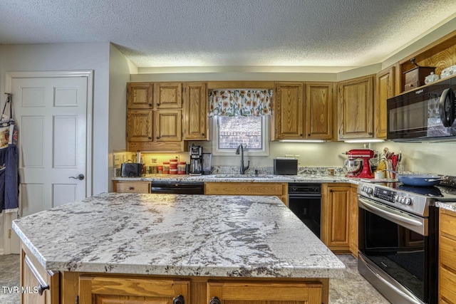 223 Willowbend Ct, Kingsport, TN 37660 - kitchen with black appliances, brown cabinets, a kitchen island, a textured ceiling, and light stone countertops