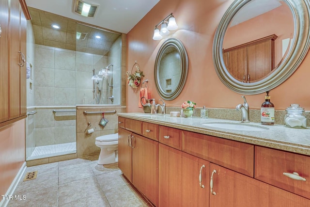 223 Willowbend Ct, Kingsport, TN 37660 - bathroom with double vanity, a tile shower, tile patterned flooring, and recessed lighting