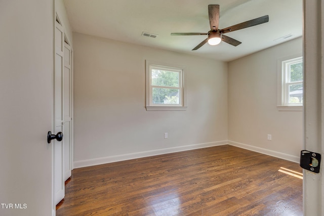 203 Hickory Rd, Bristol, TN 37620 - unfurnished bedroom with multiple windows, wood finished floors, a closet, and ceiling fan