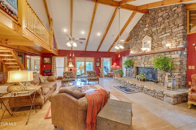 284 Bulldog Holw, Elizabethton, TN 37643 - living room featuring high vaulted ceiling, stairs, beamed ceiling, ceiling fan, and a stone fireplace