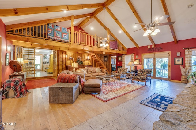 284 Bulldog Holw, Elizabethton, TN 37643 - living room with high vaulted ceiling, beam ceiling, stairs, a ceiling fan, and wood finished floors