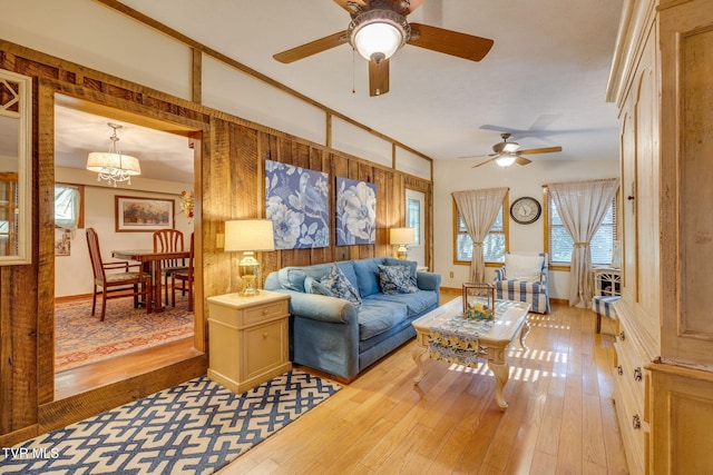 284 Bulldog Holw, Elizabethton, TN 37643 - living area featuring light wood-type flooring, ceiling fan, and a chandelier
