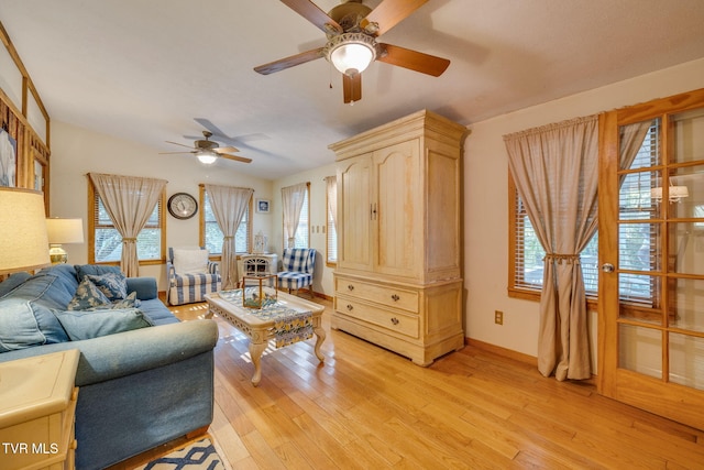 284 Bulldog Holw, Elizabethton, TN 37643 - living area with a ceiling fan, light wood finished floors, and healthy amount of natural light
