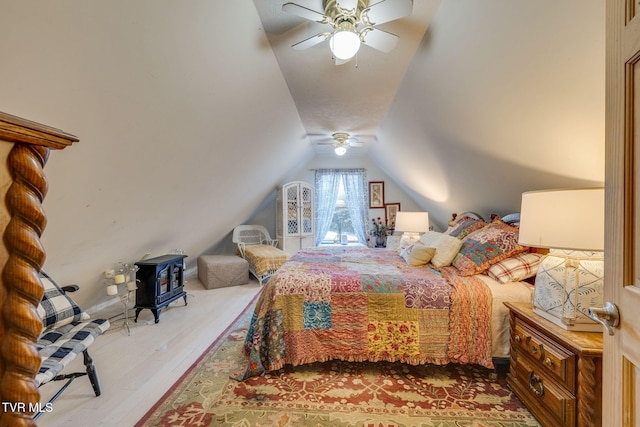 284 Bulldog Holw, Elizabethton, TN 37643 - bedroom featuring lofted ceiling, wood finished floors, and a ceiling fan