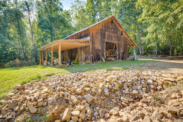 284 Bulldog Holw, Elizabethton, TN 37643 - view of pole building featuring a wooded view
