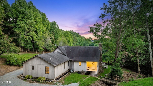 284 Bulldog Holw, Elizabethton, TN 37643 - view of front of property with a shingled roof, a chimney, and stairs