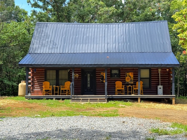 1014 Lightnen Rd, Parrottsville, TN 37843 - log-style house featuring a porch, log exterior, and a metal roof