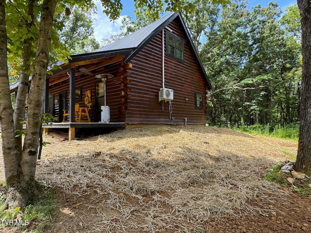 1014 Lightnen Rd, Parrottsville, TN 37843 - view of side of property featuring log siding and a metal roof