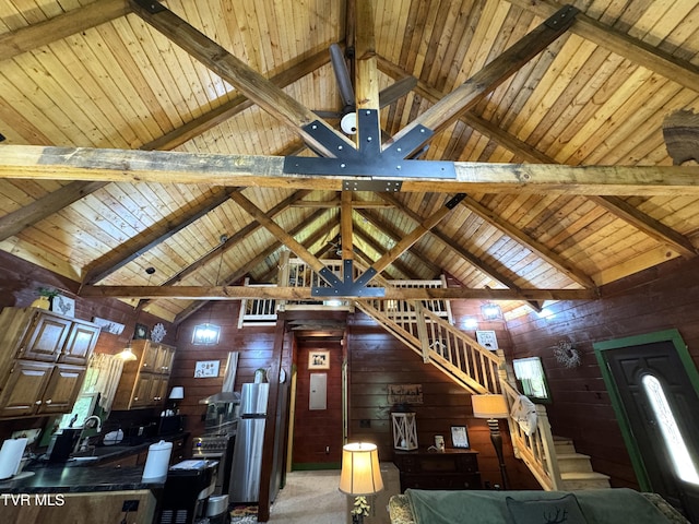 1014 Lightnen Rd, Parrottsville, TN 37843 - living room featuring wood walls, a wood ceiling with exposed beams, and stairway