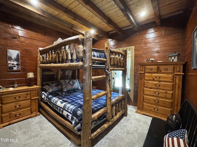 1014 Lightnen Rd, Parrottsville, TN 37843 - bedroom with wood walls, carpet flooring, and a wooden ceiling with exposed beams