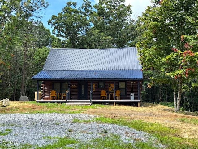 1014 Lightnen Rd, Parrottsville, TN 37843 - view of front of property with covered porch, a metal roof, and log siding