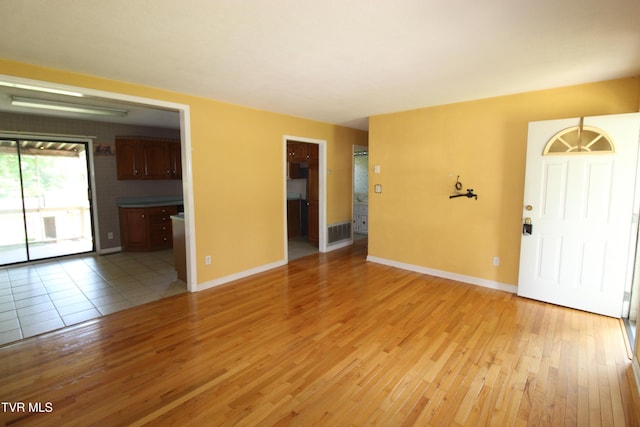 288 Hicks Rd, Piney Flats, TN 37686 - unfurnished living room featuring light wood-style flooring