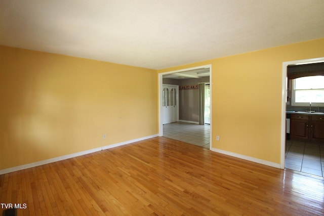 288 Hicks Rd, Piney Flats, TN 37686 - spare room with light wood-style flooring and baseboards