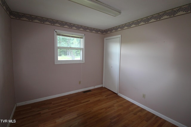 288 Hicks Rd, Piney Flats, TN 37686 - unfurnished room featuring wood finished floors and baseboards