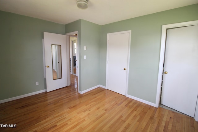 288 Hicks Rd, Piney Flats, TN 37686 - unfurnished bedroom with light wood-style flooring