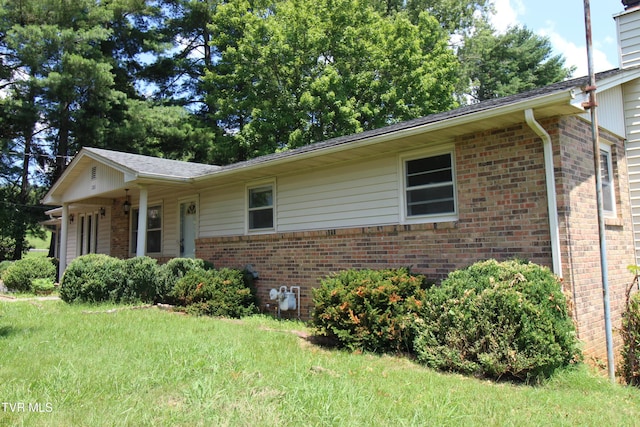 288 Hicks Rd, Piney Flats, TN 37686 - single story home with brick siding and a front yard