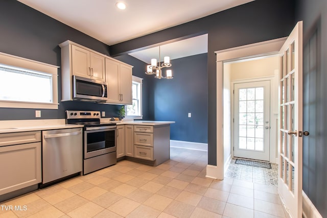 917 Pennsylvania Ave, Bristol, TN 37620 - kitchen featuring stainless steel appliances, a chandelier, light countertops, healthy amount of natural light, and recessed lighting
