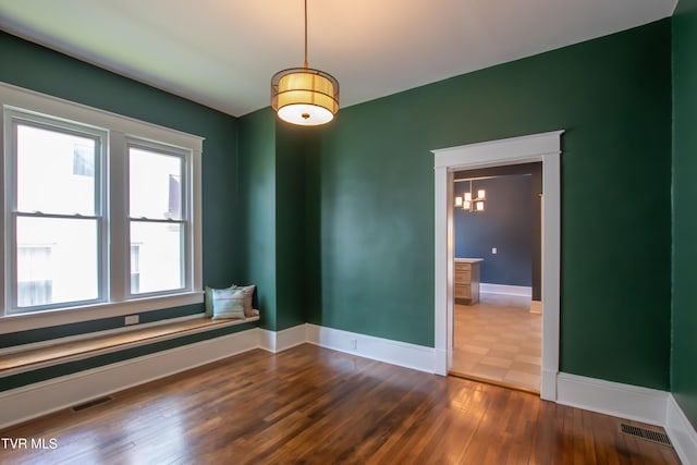 917 Pennsylvania Ave, Bristol, TN 37620 - spare room featuring baseboards and dark wood-style floors