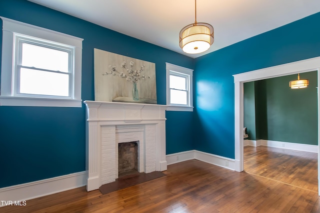 917 Pennsylvania Ave, Bristol, TN 37620 - unfurnished living room featuring a fireplace and wood finished floors
