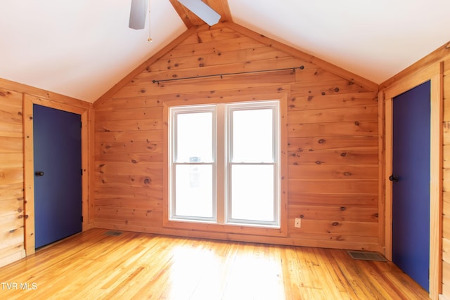917 Pennsylvania Ave, Bristol, TN 37620 - bonus room with vaulted ceiling, wood walls, light wood-style flooring, and a ceiling fan