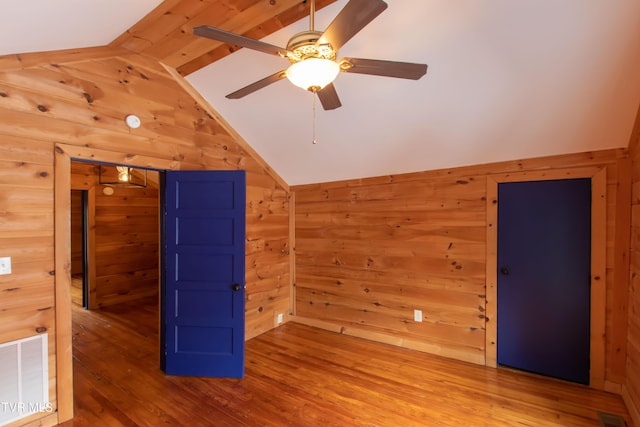 917 Pennsylvania Ave, Bristol, TN 37620 - additional living space with wooden walls, wood finished floors, and a ceiling fan