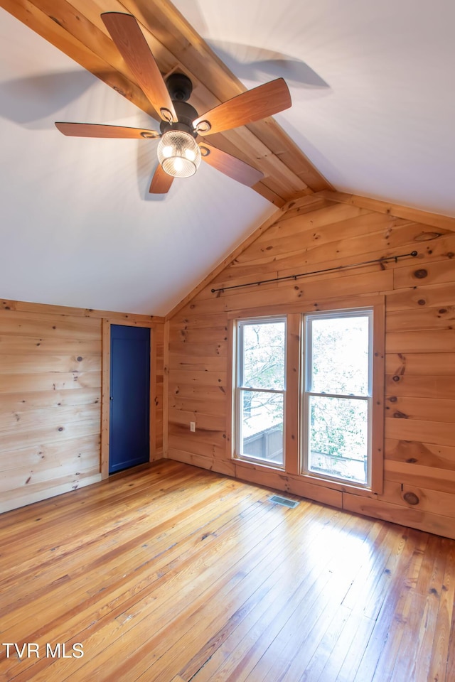 917 Pennsylvania Ave, Bristol, TN 37620 - bonus room with wood walls, lofted ceiling, light wood-type flooring, and a ceiling fan