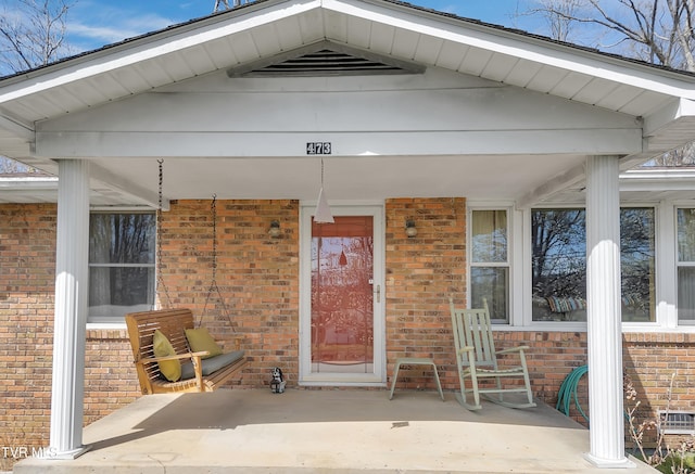 473 Oak Grove Rd, Gray, TN 37615 - property entrance featuring brick siding and covered porch