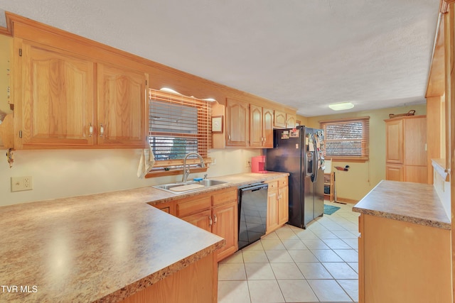 473 Oak Grove Rd, Gray, TN 37615 - kitchen with black appliances, light countertops, light tile patterned floors, and light brown cabinets