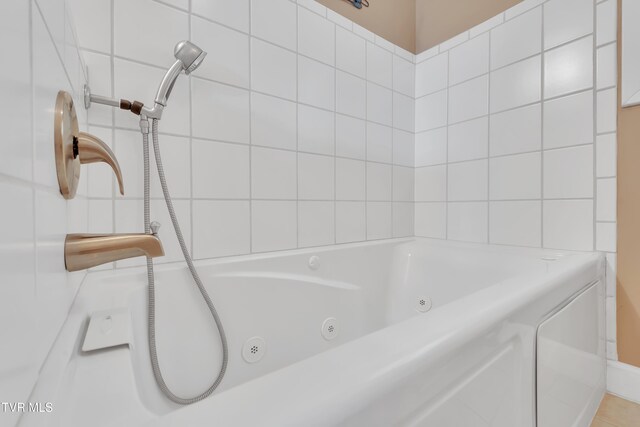 473 Oak Grove Rd, Gray, TN 37615 - full bathroom with a jetted tub and a shower