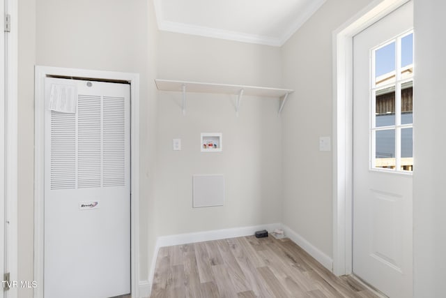 1024 Walnut Ave, Kingsport, TN 37660 - laundry area with a heating unit, hookup for a washing machine, crown molding, light wood-type flooring, and plenty of natural light