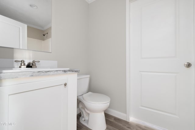 1024 Walnut Ave, Kingsport, TN 37660 - bathroom featuring ornamental molding, wood finished floors, and vanity
