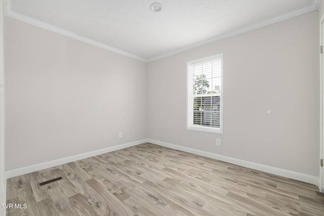 1024 Walnut Ave, Kingsport, TN 37660 - empty room with crown molding and light wood-style floors